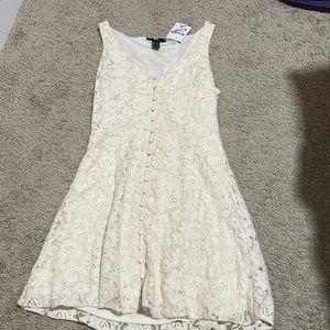 cream colored forever 21 dress- inbetween a mini and a midi length dress -size:M